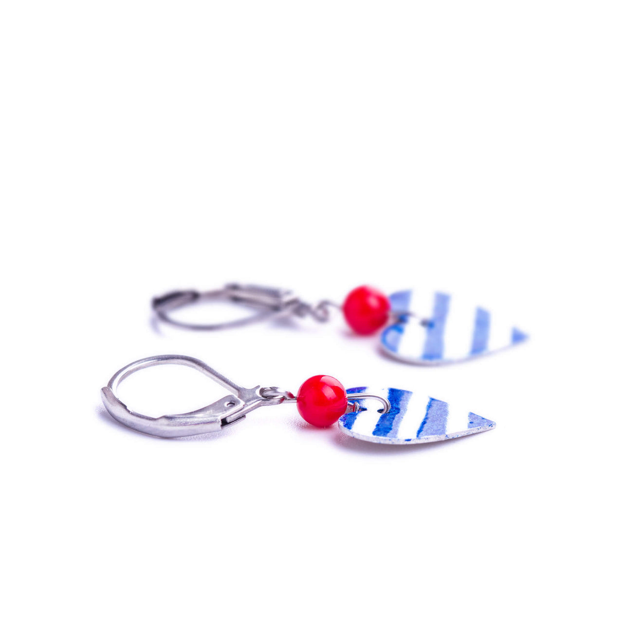 heart earrings with navy blue stripes and red coral beads - photo from left side